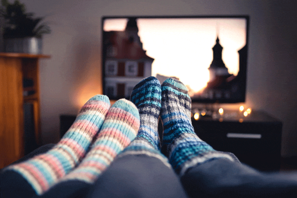 couple sitting on the couch cold with socks on heating maintenance prescott az prescott valley az 