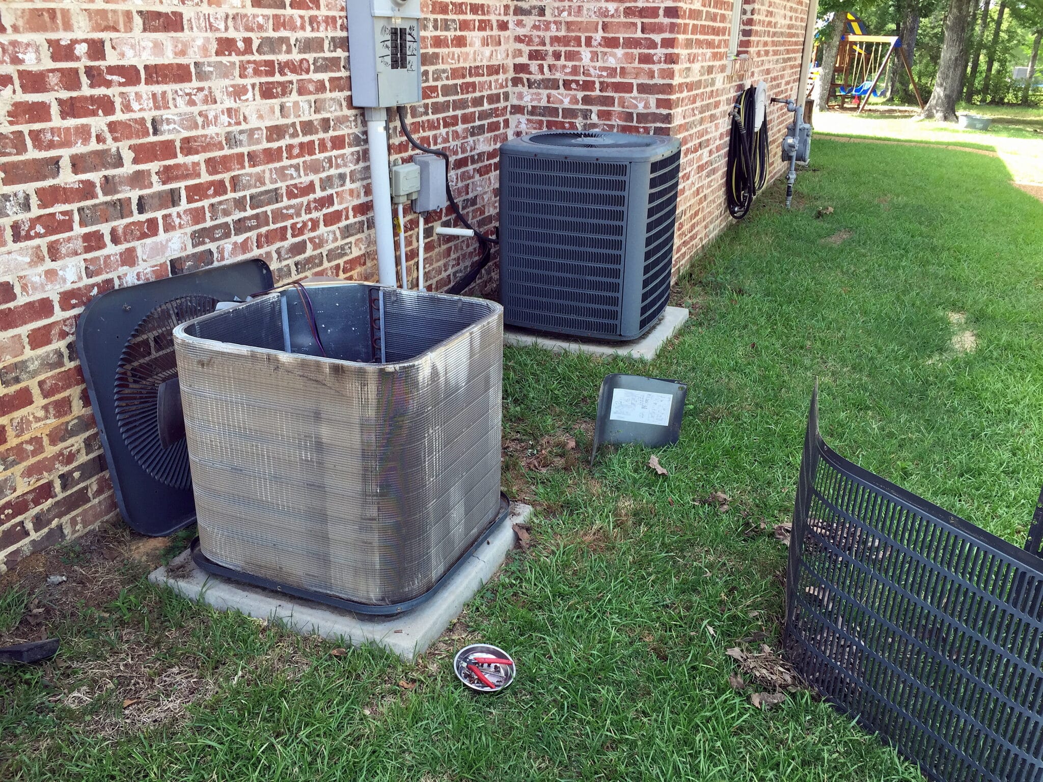 Air conditioner maintenance, cleaning condenser coils, HVAC.